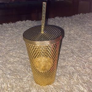 Starbucks new grande gold cup
